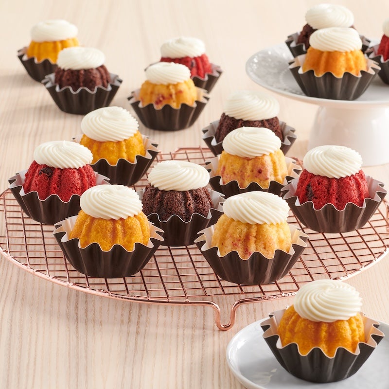 Assortment of Bundtinis, mini Bundt cakes crowned with cream cheese - Shop Bundtinis
