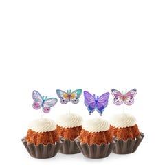 Bundtinis® topped with frosting and decorated with purple, green, pink sparkled butterflies.