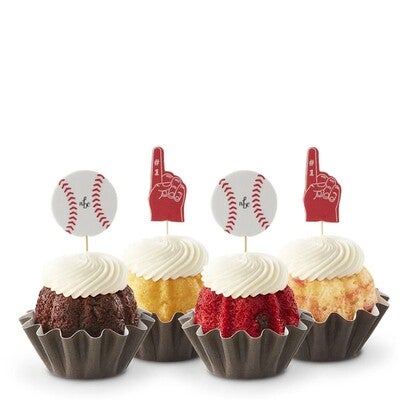 Bundtinis - Mini Bundt Cakes with cream cheese frosting and baseball theme toppers; assortment of foam fingers and baseballs perfectly placed on top of each Bundtini.