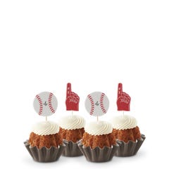 Carrot flavored mini bundt cakes topped with frosting with baseball and #1 foam finger toppers.