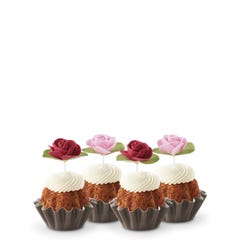 Cupcake sized bundt cakes in Carrot flavor with a pink and red rose toppers