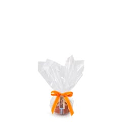 Personal size Carrot bundt cake, packaged in a plastic container and gift-wrapped in cellophane. 