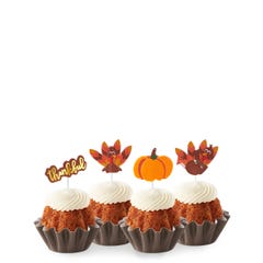 New! Thankful Turkey Carrot Bundtinis® topped with frosting and decorated with pumpkin and turkey toppers as well as a topper with Thankful written in cursive. 