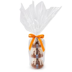 Three personal-size Carrot bundt cakes stacked vertically, packaged in a plastic container and gift-wrapped in cellophane. 