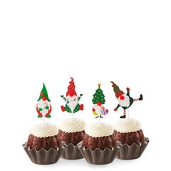 Chocolate Chocolate Chip mini bundt cakes topped with four Christmas-themed gnome decorations: one in green with a mistletoe, one in red with a tree, one in stripes with a gift, and one in red and white.