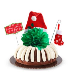 8" Bundt Cake with a green bow and Santa hat in the center, Christmas stocking deco, and Santa's Slice of Joy Card