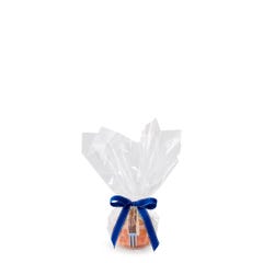 Personal size Confetti bundt cake, packaged in a plastic container and gift-wrapped in cellophane. 