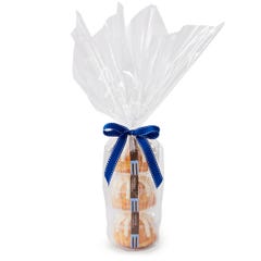 Three personal-size Confetti bundt cakes stacked vertically, packaged in a plastic container and gift-wrapped in cellophane. 