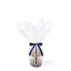 Two personal-size bundt cakes stacked vertically, packaged in a plastic container and gift-wrapped in cellophane. 