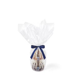 Two personal-size bundt cakes stacked vertically, packaged in a plastic container and gift-wrapped in cellophane. 