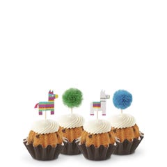Cupcake like bundt cakes with frosting and decorated with party pinatas and poms. 