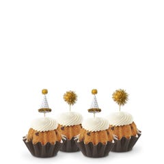 Bundtinis adorned with festive party hat toppers and golden pom-poms themed for a New Year's celebration.