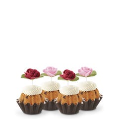 Cupcake sized bundt cakes in Gluten-Free Chocolate Chip Cookie flavor with a pink and red rose toppers