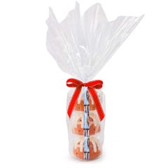 Three personal-size Gluten-Free Chocolate Chip Cookie bundt cakes stacked vertically, packaged in a plastic container and gift-wrapped in cellophane. 