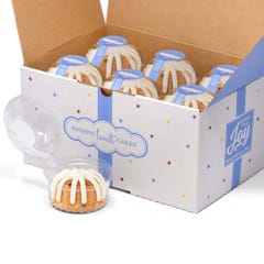 A box filled with 12 individually packaged Gluten-Free Chocolate Chip Cookie bundtlets. 