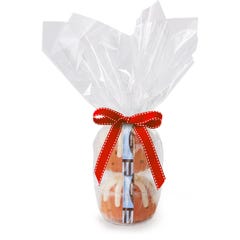 Two personal-size Gluten-Free Chocolate Chip Cookie bundt cakes stacked vertically, packaged in a plastic container and gift-wrapped in cellophane. 