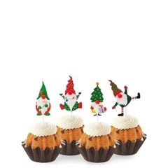 Gluten-Free Chocolate Chip Cookie mini bundt cakes topped with four Christmas-themed gnome decorations: one in green with a mistletoe, one in red with a tree, one in stripes with a gift, and one in red and white.