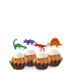 Gluten Free Bundtinis® topped with frosting and decorated with green, purple, red and orange dinosaurs.