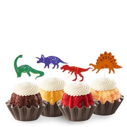 Bundtinis® topped with frosting and decorated with green, purple, red and orange dinosaurs.
