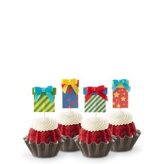Cupcake-sized mini cakes with frosting and birthday present toppers with different celebratory designs.