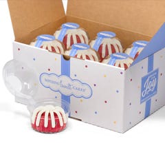 A box filled with 12 individually packaged Red Velvet bundtlets. 