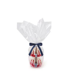 Two personal-size Red Velvet bundt cakes stacked vertically, packaged in a plastic container and gift-wrapped in cellophane. 