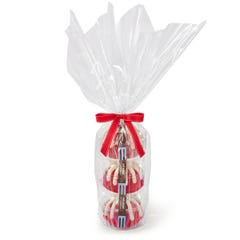 Three personal-size Red Velvet bundt cakes stacked vertically, packaged in a plastic container and gift-wrapped in cellophane. 