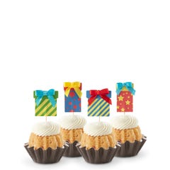 Cupcake-sized mini cakes with frosting and birthday present toppers with different celebratory designs.
