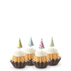 Dotted party hats top the frosting covered mini bundt cakes.