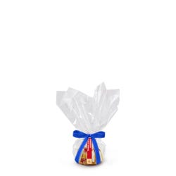 One individually packaged Key Lime Bundtlet gift wrapped in cellophane with a blue stitched ribbon.