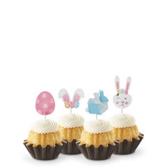 Easter-themed Vanilla mini Bundt cakes with festive bunny and egg toppers, showcasing a variety of flavors and designs.