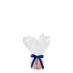 Personal size Vanilla bundt cake, packaged in a plastic container and gift-wrapped in cellophane. 