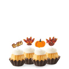 New! Classic Vanilla Thankful Turkey Bundtinis® topped with frosting and decorated with pumpkin and turkey toppers as well as a topper with Thankful written in cursive. 