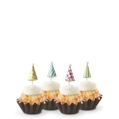 Dotted party hats top the frosting covered mini bundt cakes.