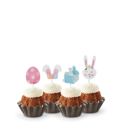 Easter-themed Carrot mini Bundt cakes with festive bunny and egg toppers, showcasing a variety of flavors and designs.