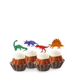 Bundtinis® topped with frosting and decorated with green, purple, red and orange dinosaurs.