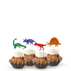 OREO Cookies & Cream Bundtinis® topped with frosting and decorated with green, purple, red and orange dinosaurs.